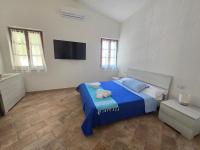 Posteľ alebo postele v izbe v ubytovaní Villa Caterina Posada