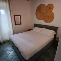 Postel nebo postele na pokoji v ubytování Agriturismo Galenzana