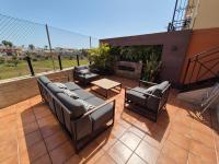 Posezení v ubytování 3 BDR House near La Zenia PRIVATE lounge terraces, fire places, BBQ, kitchen, parking