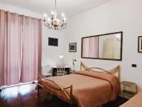 Posteľ alebo postele v izbe v ubytovaní Termini Colosseum apartment