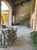 Patio lub wspólna przestrzeń na świeżym powietrzu w obiekcie Corte degli Angeli Agriturismo