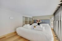 Łóżko lub łóżka w pokoju w obiekcie Elegant apartment - 2BR-5P - Champs de Mars