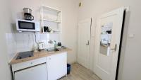 Kuchyň nebo kuchyňský kout v ubytování Flat in Zizkov -204-