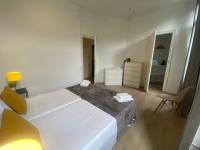 Posteľ alebo postele v izbe v ubytovaní 555 Apartments BCN