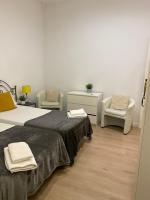 Posteľ alebo postele v izbe v ubytovaní 555 Apartments BCN