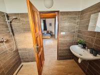 Koupelna v ubytování Wellness hotel & minipivovar Kněžínek