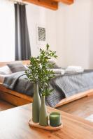 Postel nebo postele na pokoji v ubytování Wellness hotel & minipivovar Kněžínek