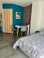 Łóżko lub łóżka w pokoju w obiekcie Blu'in - Mérignies