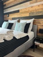 Posteľ alebo postele v izbe v ubytovaní Apartament nad Wilgą