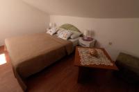 Posteľ alebo postele v izbe v ubytovaní Apartmani Kežić Drvenik