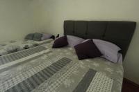 Posteľ alebo postele v izbe v ubytovaní Apartmani Kežić Drvenik