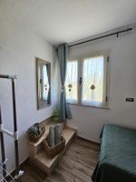 Postel nebo postele na pokoji v ubytování Villantoine De La Marina Di Orosei