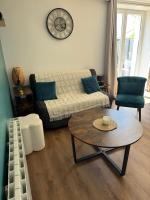 Część wypoczynkowa w obiekcie Logement avec terrasse,4 pers, parking