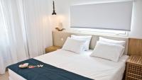 Posteľ alebo postele v izbe v ubytovaní Aristotelia Gi Ikies - Olympiada Poolside Retreats