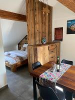 Posteľ alebo postele v izbe v ubytovaní Apartamenty Zander