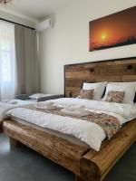 Posteľ alebo postele v izbe v ubytovaní Apartamenty Zander
