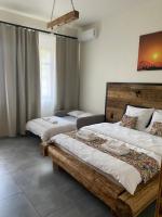Posteľ alebo postele v izbe v ubytovaní Apartamenty Zander