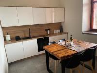 Kuchyňa alebo kuchynka v ubytovaní Apartamenty Zander