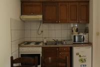 Kuchyňa alebo kuchynka v ubytovaní Apartmani Kežić Drvenik