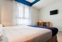 Postel nebo postele na pokoji v ubytování Hotel Villa De Pinto