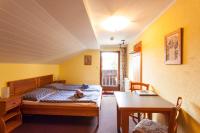 Łóżko lub łóżka w pokoju w obiekcie Haus Wildbach - Baranek Resorts