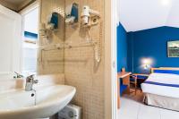 Postel nebo postele na pokoji v ubytování Hotel Villa De Pinto