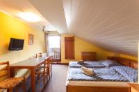 Łóżko lub łóżka w pokoju w obiekcie Haus Wildbach - Baranek Resorts