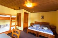 Łóżko lub łóżka w pokoju w obiekcie Haus Wildbach - Baranek Resorts
