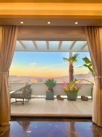 Posedenie v ubytovaní One 360 Skyline Athens Penthouses