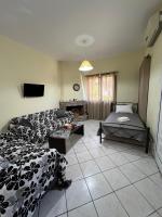 Postel nebo postele na pokoji v ubytování Village Apartment