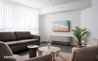 Ein Sitzbereich in der Unterkunft Luxury Apartments And Studios At Sea Side By Rently