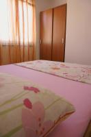 Posteľ alebo postele v izbe v ubytovaní Croatian Home Apartments