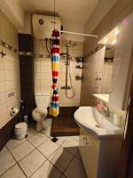 Kúpeľňa v ubytovaní Roses RT apartments Skioni III
