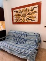 A seating area at Appartamento U scrusciu ro mari