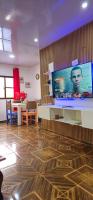 TV a/nebo společenská místnost v ubytování Cabaña Vistas del Bosque jarabacoa
