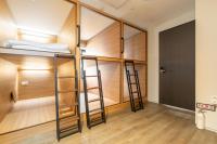Ein Bett oder Betten in einem Zimmer der Unterkunft Boro Hanok Hostel in Myeongdong