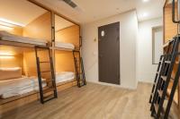 Ein Bett oder Betten in einem Zimmer der Unterkunft Boro Hanok Hostel in Myeongdong