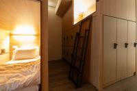 Ein Bett oder Betten in einem Zimmer der Unterkunft Boro Hanok Hostel in Myeongdong