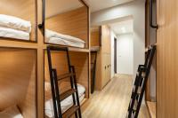 Ein Bett oder Betten in einem Zimmer der Unterkunft Boro Hanok Hostel in Myeongdong