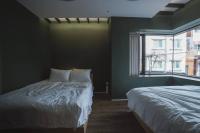 Ein Bett oder Betten in einem Zimmer der Unterkunft Boro Hanok Hostel in Myeongdong