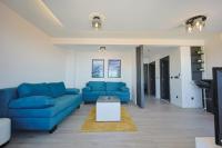 Posezení v ubytování La Storia Apartments