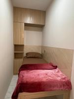 Ein Bett oder Betten in einem Zimmer der Unterkunft Garden Residence