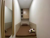 Ein Bett oder Betten in einem Zimmer der Unterkunft Garden Residence