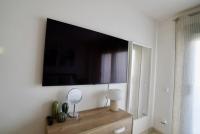 TV a/nebo společenská místnost v ubytování El Balcón del Novo -Novo Sancti Petri- Luxury 3 Bedrooms - Piscina y Pista Padel