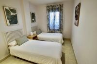 Postel nebo postele na pokoji v ubytování El Balcón del Novo -Novo Sancti Petri- Luxury 3 Bedrooms - Piscina y Pista Padel