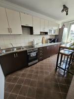 Kuchyňa alebo kuchynka v ubytovaní Apartament Dworzec PKP