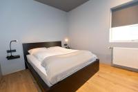 Postel nebo postele na pokoji v ubytování Luxury Loft Apartment Akureyri