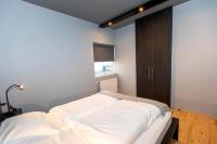 Postel nebo postele na pokoji v ubytování Luxury Loft Apartment Akureyri