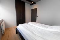 Postel nebo postele na pokoji v ubytování Luxury Loft Apartment Akureyri