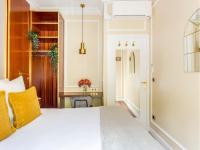 Łóżko lub łóżka w pokoju w obiekcie Merveil - Luxury Suite - Marais - Antoine I